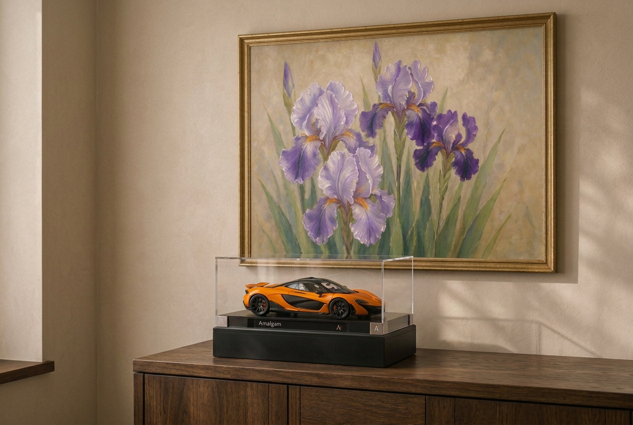 An Amalgam car memorial urn displayed beneath an embellished iris painting